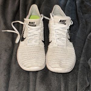Nike Free RN Flyknit women’s size 8, used but in good condition.